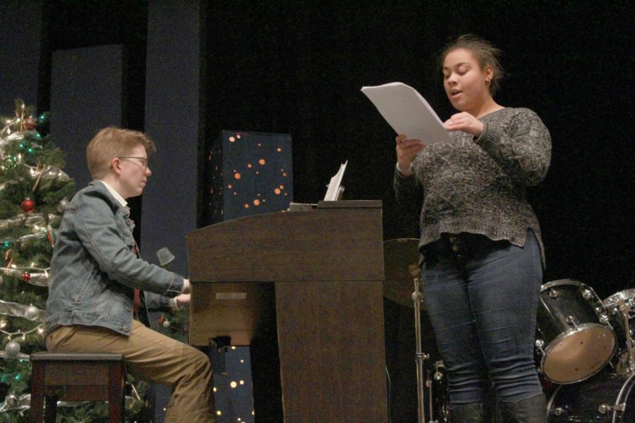 Singing “In my Own Little Corner,” senior De’Avia Ray auditions for the part of Cinderella for the spring musical as vocal music teacher and co-director Christine Valish plays the piano for her.