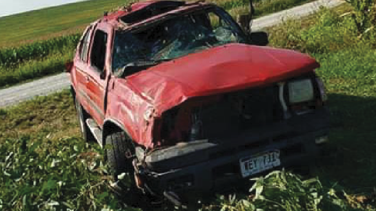 After losing control and rolling a few times, junior Kyle Baxter’s SUV lands in a field in Weeping Water, Neb. Baxter was rushed to a local hospital with severe injuries. He was not wearing a seat belt during the September accident. 