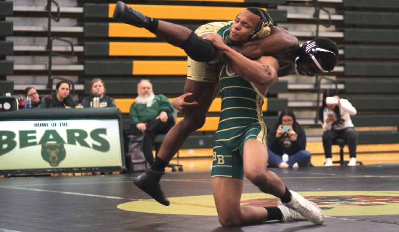 At the Green and Gold scrimmage on Dec. 3, junior Steven Sturdivant does a double on sophomore Yusuf Mohammed and receives 2 points. Ultimately the match finishes with Mohammed winning 6-3.  
