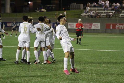 Francisco Barajas-Castro celebrates towards the crowd after a goal was scored against Papillion South.