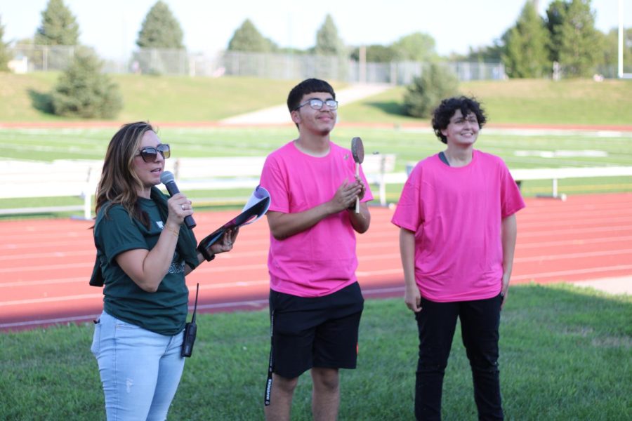 AP coordinator Jennifer Cuddy recognizes seniors Bryan Benitez and James Strats for earning the AP Scholar Award during AP Bootcamp on Aug. 23, 2022. Three alumni also earned this award.