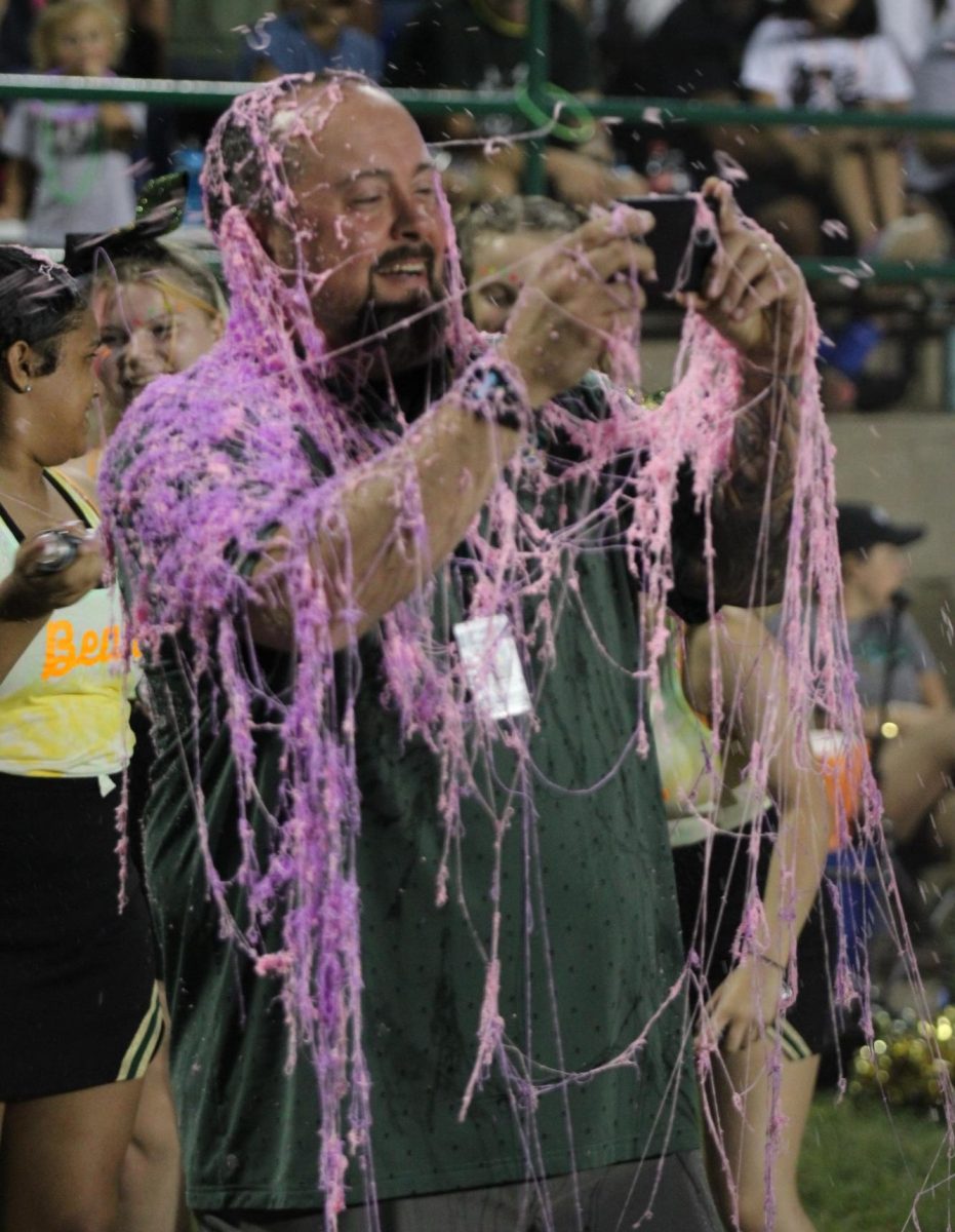 AND SNAP. After getting attacked by silly string principal Anthony Clark-Kaczmarek takes his '180 days of joy' picture. 