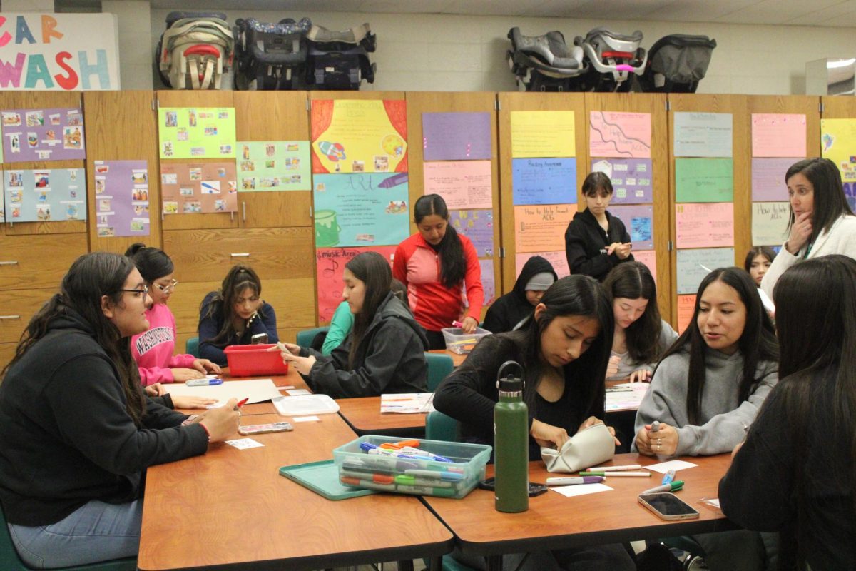 HOSA members create posters and notecards for Mental Health Awareness April 24. They decorated them with kind messages and displayed them around the school to spread awareness. 