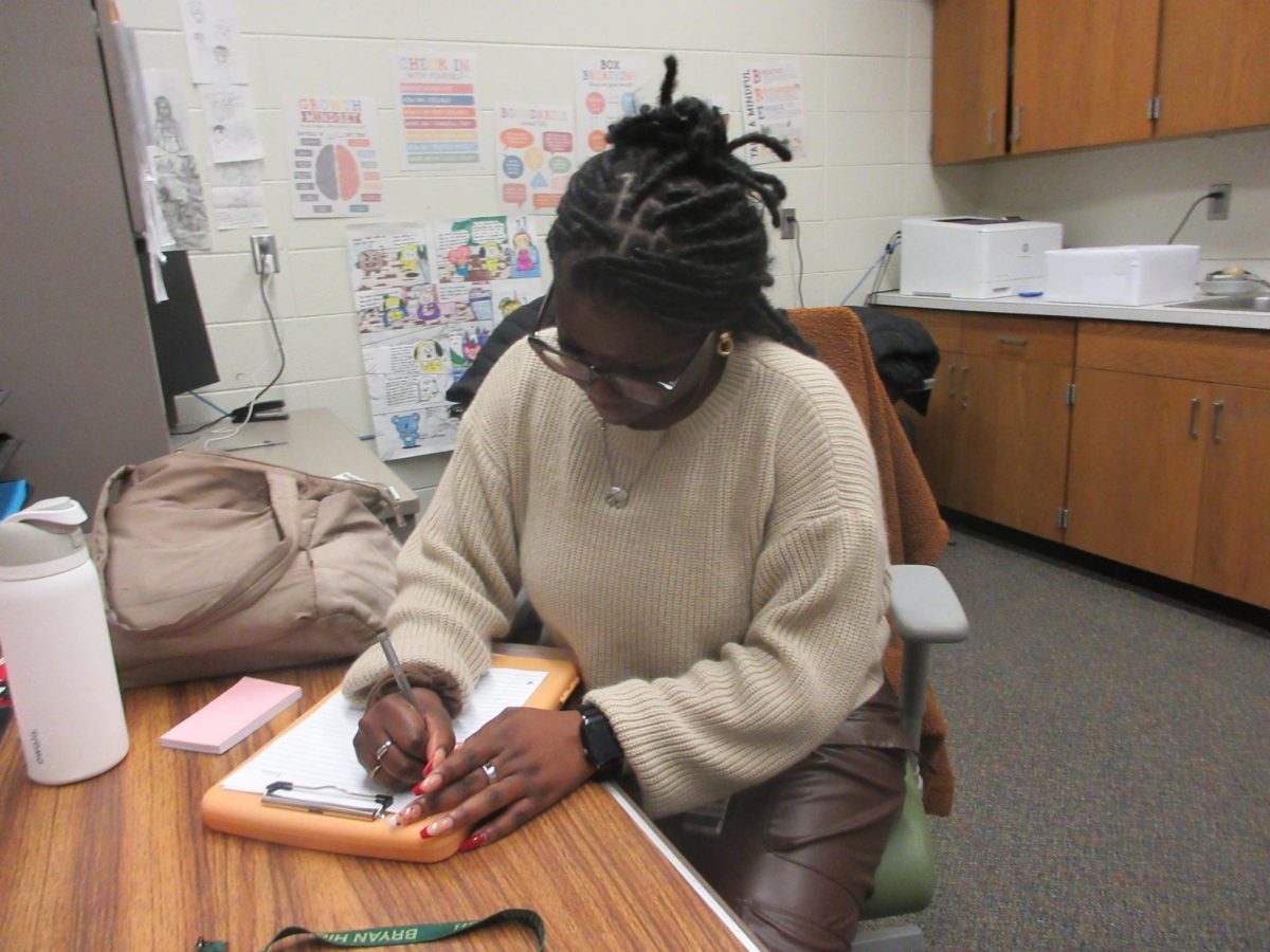 Helping students grow, Natavia Jones does her best each day as Bryan's Nebraska College Preparatory Academy counselor to aid the NCPA students of Bryan.